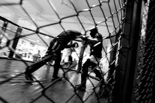Paul Daley sparring, black and white documentary photography by Doug Marke — image 4 of 8.